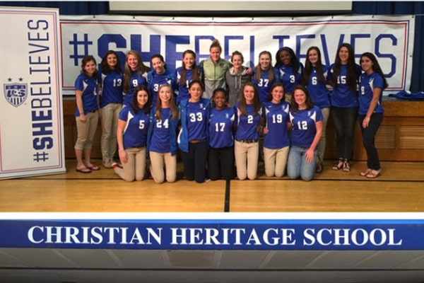 Alyssa Naeher Biography. Picture shows Alyssa visiting her Christian Heritage School